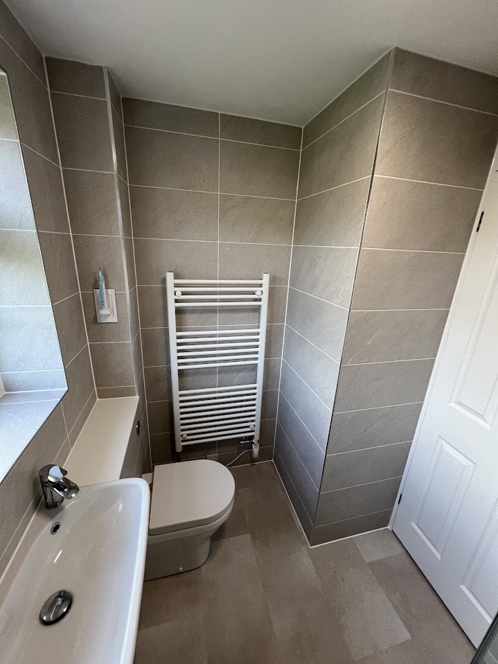 Warm Stone & Fitted Shower Room